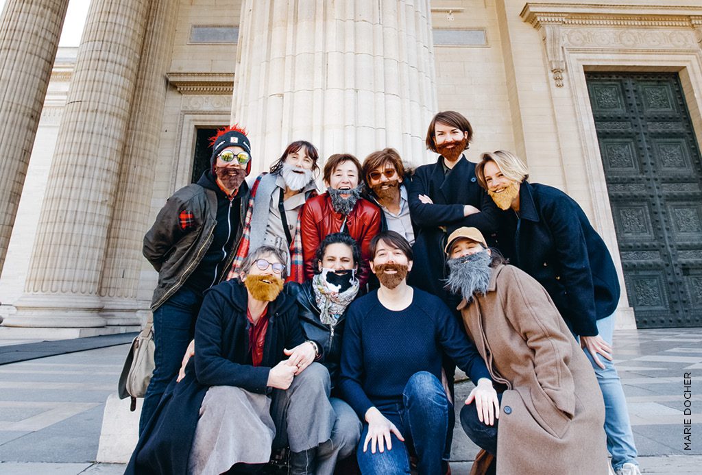 Des membres du collectif La Barbe, à Paris, devant le Panthéon, le 19 mars 2022.