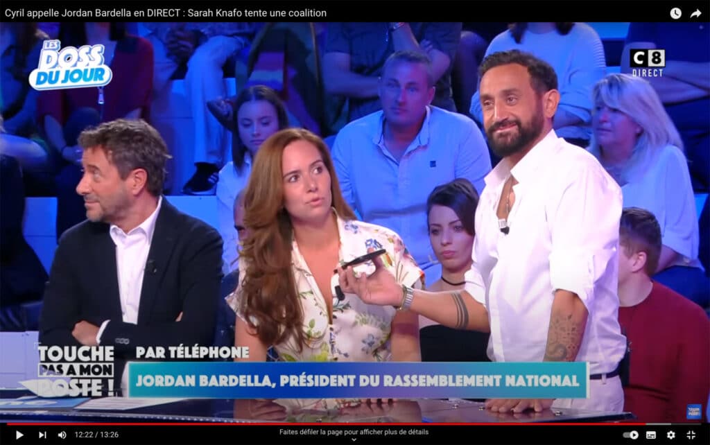 Le 13 juin 2024, deux semaines avant le premier tour des élections législatives, sur le plateau de Touche pas à mon poste sur C8, Cyril Hanouna appelle en direct Jordan Bardella pour organiser un rapprochement avec Sarah Knafo (Reconquête !).Touche pas à mon poste ! / D.R.